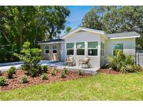 Cute bungalow with modern updates and a landscaped yard at 426 Lexington St, Dunedin, FL 34698