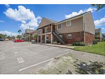 Two-story building with ample parking at 200 Country Club Dr # 1004, Largo, FL 33771