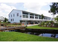 Waterfront property with canal views and a community of townhouses at 1873 Mazo Mnr # T5, Lutz, FL 33558