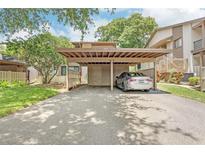 Covered carport parking for residents at 13002 Wedgewood Way # D, Hudson, FL 34667
