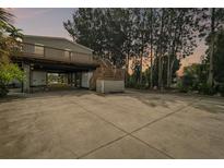 Elevated home with large deck and ample parking at 14904 Old Dixie Hwy, Hudson, FL 34667