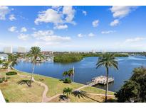 Scenic waterfront view with a dock and lush landscaping at 1847 Shore S Dr # 614, South Pasadena, FL 33707