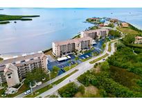 Condominium complex with private parking and waterfront views at 4620 Bay Blvd # 1158, Port Richey, FL 34668