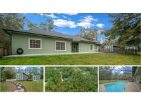 Inviting single-story home with a well-maintained yard and two storage sheds at 16325 Hibiscus Rd, Brooksville, FL 34601