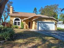 Charming single-Gathering home with a two-car garage and inviting curb appeal at 1995 59Th S Cir, St Petersburg, FL 33712