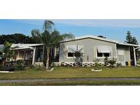 Charming single-story home with well-maintained lawn and minimal landscaping at 36312 Toranado Way, Zephyrhills, FL 33541