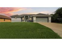 Charming single-story home with a well-maintained lawn and attached two-car garage at 10056 Lebanon Dr, Port Charlotte, FL 33981