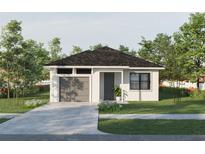 Charming single-story home featuring a well-manicured lawn, a gray garage door, and a concrete driveway at 9024 Waterbird Way, Brooksville, FL 34613