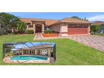 Charming single-story home with a well-manicured lawn and a screened in pool and lanai at 5411 Wellfield Rd, New Port Richey, FL 34655