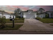 Charming single-Gathering home with a well-maintained lawn and a two-car garage at 4082 Watson Dr, New Port Richey, FL 34655