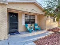 Charming front porch with seating, perfect for enjoying quiet moments in this lovely single-Gathering home at 4934 Amherst Ct, New Port Richey, FL 34652
