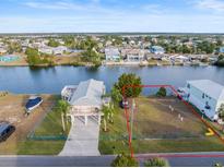 Waterfront property boasts ample land, perfect for building, with easy canal access and serene surroundings at 3340 Oleander, Hernando Beach, FL 34607