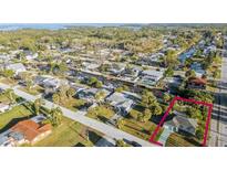 Waterfront community view of canals, homes and mature trees offering serene coastal living at 5447 Quist Dr, Port Richey, FL 34668