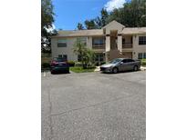 Inviting two-story condo with well-maintained landscaping and ample parking at 7802 Hardwick Dr # 1116, New Port Richey, FL 34653
