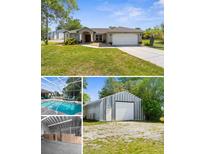Charming home featuring a well-manicured lawn, attached garage, and metal outbuilding at 14031 Hexam Rd, Brooksville, FL 34613