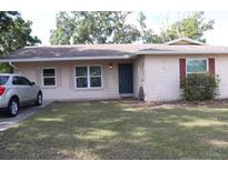 Charming single-story home featuring a well-maintained front yard and a welcoming entrance at 101 Sheryl Lynn Dr, Brandon, FL 33510