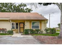 Charming single-story home with guest parking, mature trees and well-maintained landscaping at 10670 43Rd N St # 204, Clearwater, FL 33762