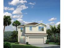 Two-story home featuring an attached two-car garage, covered entry, and tropical landscaping at 8917 Waxwing Way, Parrish, FL 34219