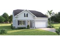 Charming single-Gathering home with a well-maintained lawn and a two-car garage at 20021 Golden Glow Loop, Venice, FL 34292