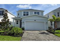 Charming two-story home featuring a two-car garage and well-maintained landscaping at 14437 Maiden Ter, Lakewood Ranch, FL 34211