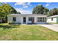 Charming single-story home featuring a well-maintained lawn and inviting curb appeal at 4007 S Renellie Dr, Tampa, FL 33611