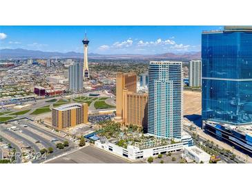 Aerial view of a modern highrise building in a vibrant city, showcasing the surrounding landscape and amenities at 2700 Las Vegas Blvd # 4003, Las Vegas, NV 89109