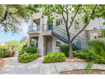 Two-story building with stairs and landscaping at 2201 Ramsgate Dr # 811, Henderson, NV 89074