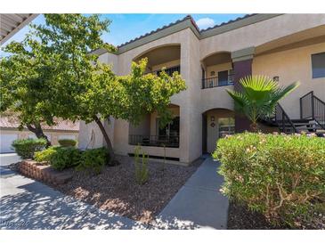 Two-story building with balconies and landscaping at 7885 W Flamingo Rd # 1161, Las Vegas, NV 89147