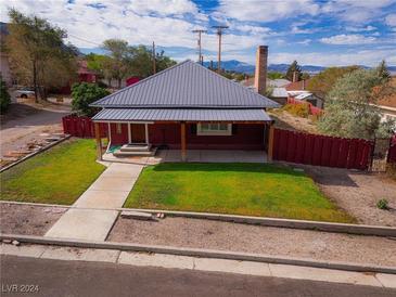 Charming bungalow with covered porch and yard at 3 Avenue K, McGill, NV 89318