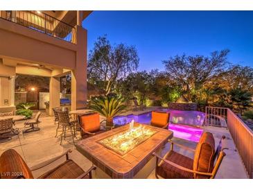 Outdoor firepit and alluring pool with spa; perfect for entertaining at 2994 San Lorenzo Ct, Henderson, NV 89052