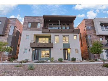 Modern three-story townhome with two-car garage and balcony at 4288 Veraz St, Las Vegas, NV 89135