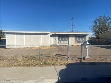 Single story house with front yard and a mailbox at 616 Bowman Ave, Las Vegas, NV 89106