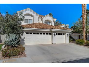 Two-story house with a large two-car garage at 8128 Bay Harbor Dr, Las Vegas, NV 89128