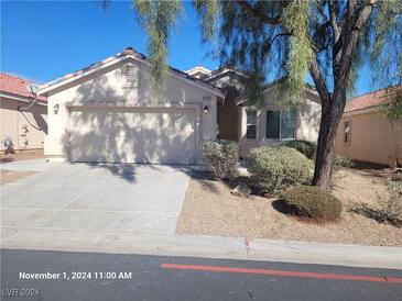 Single-story house with a two-car garage at 2758 Tilten Kilt Ave, North Las Vegas, NV 89081