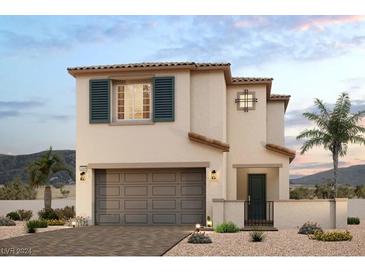 Two-story home with attached garage and desert landscaping at 8922 Faxom St, Las Vegas, NV 89166