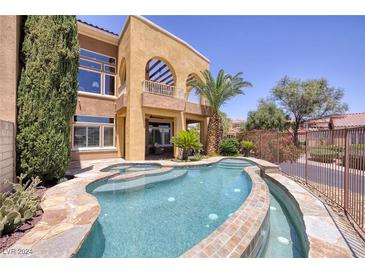 Luxury pool and spa with stone coping and landscaping at 26 Cerchio Alto, Henderson, NV 89011