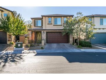 Two story home with attached garage at 2947 Caxton Grove Dr, Henderson, NV 89052