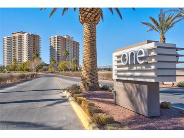 Entryway with wood floors, mirror, and built-in shelf at 8255 Las Vegas Blvd # 504, Las Vegas, NV 89123