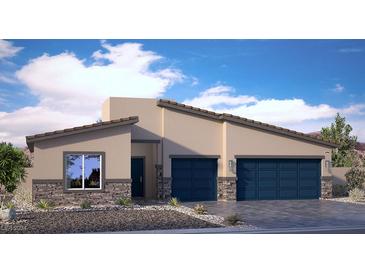 Two-story stucco home with a three-car garage and stone accents at 7623 Phoenix Falls St # Lot 44, North Las Vegas, NV 89084