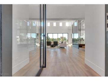 Bright entry with glass doors leading to a spacious living area at 7 Penn Cross Ct, Henderson, NV 89052