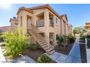 Two story building exterior with stairs and walkway at 2110 Los Feliz St # 1097, Las Vegas, NV 89156