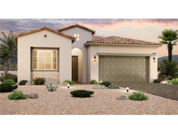 One-story home with a two-car garage, desert landscaping, and Spanish-style tile roof at 182 Cabo Cruces Dr, Henderson, NV 89011