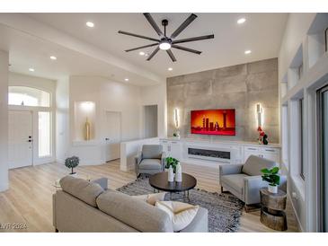 Bright living room features a modern fireplace and stylish seating at 10512 Findlay Ave, Las Vegas, NV 89134