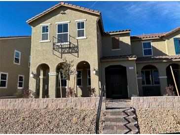 Beautiful two-story home with a balcony and landscaping at 2609 Via Napoli, Henderson, NV 89044