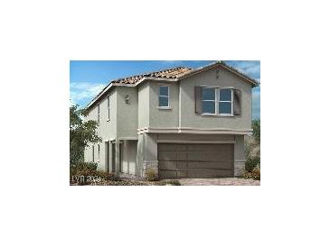 Two-story house with attached garage and neutral color scheme at 4169 Nopal Serrano Ave, Las Vegas, NV 89141