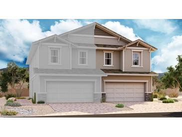 Two-story home with a two-car garage and desert landscaping at 114 Antler Square Ln, Henderson, NV 89011