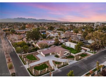 Luxury home with expansive grounds, putting green, and distant mountain views at 1420 Westwood Dr, Las Vegas, NV 89102