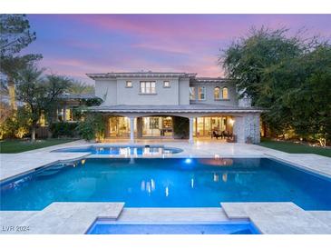 Luxury home with inviting pool, spa, and expansive patio perfect for entertaining at 10152 Kearney Hill Pl, Las Vegas, NV 89144