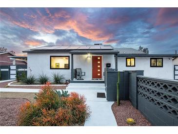 Modern single story home with solar panels and landscaped front yard at 1342 Barnard Dr, Las Vegas, NV 89102