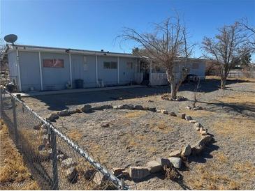 Single-story house with a spacious yard and mountain views at 1851 Janet Ln, Pahrump, NV 89060